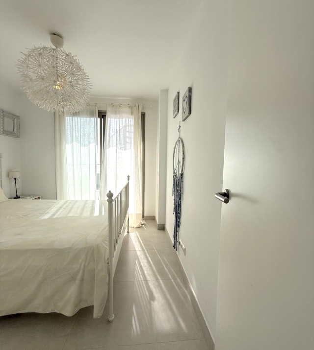 Resa Estates Ibiza longter rental Cala Tarida penthouse bedroom 1.jpeg